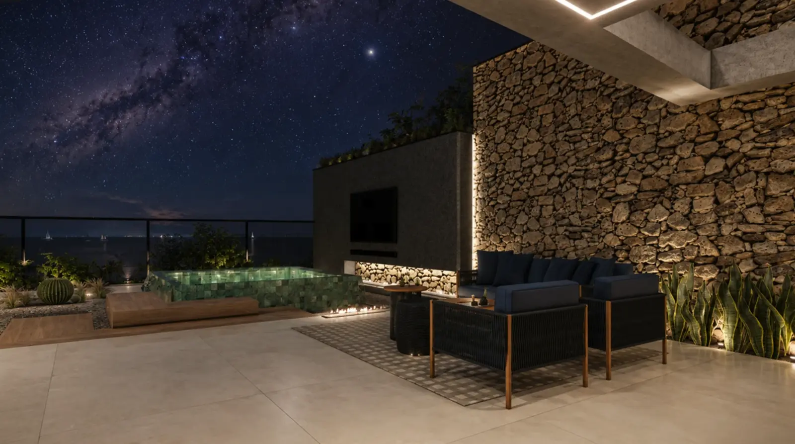 Lounge externo à noite com piscina em pastilha verde